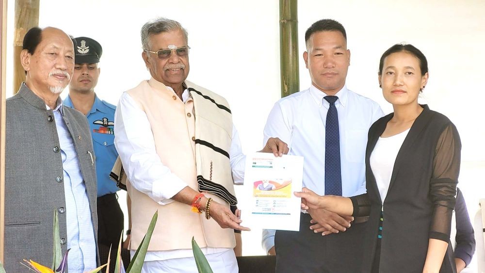 Governor La Ganesan, Chief Minister Neiphiu Rio and Health Minister P Paiwang Konyak hand over AB PMJAY card during the inauguration of Botsa PHC new building on September 29. (Morung Photo) Governor La Ganesan, Chief Minister Neiphiu Rio and Health Minister P Paiwang Konyak hand over AB PMJAY card during the inauguration of Botsa PHC new building on September 29. (Morung Photo)